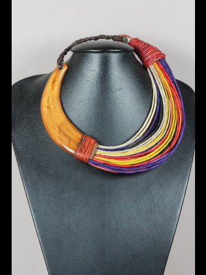 Necklace leather threads and warthog tusk
