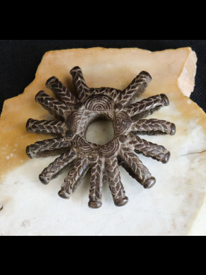 Pendant in bronze "Dogon sun"