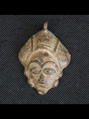 Pendant in brass