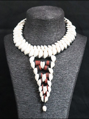 Necklace in cowry shells and bakelite heishi disk beads