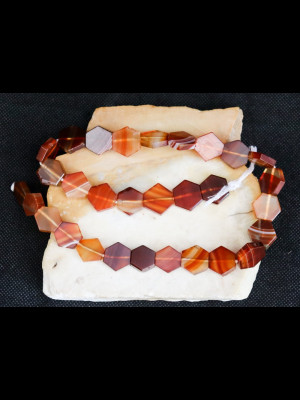 Strand of 30 hexagonal carnelian beads