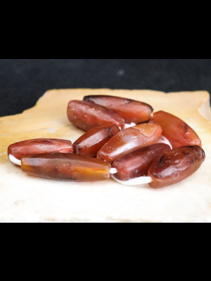 Strand of 9 old carnelian beads