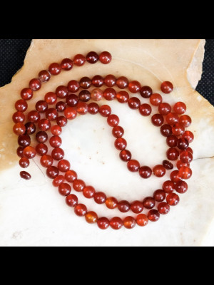 Strand of 100 carnelian round beads