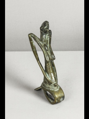 Dogon woman in bronze