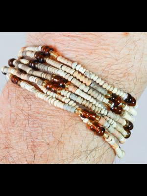 7 bracelets with terra cotta and glass beads