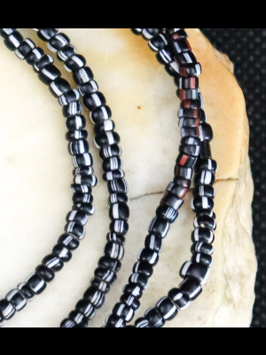 Strand of small glass beads 