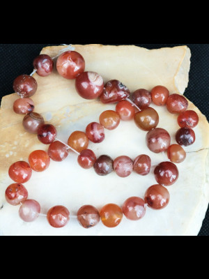 Strand of 35 carnelian beads 