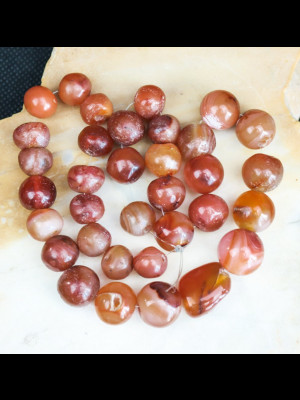 Strand of 35 carnelian beads