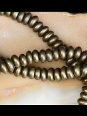 Strand of 307 brass beads