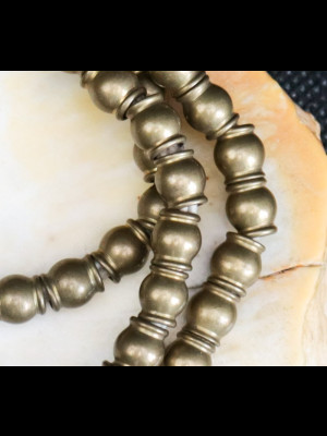 Strand of 106 brass beads