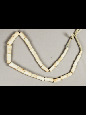 15 old beads in white coral