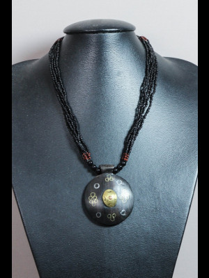 Necklace with glass beads, a wood pendant with brass and copper