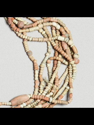 9 strands of terracotta beads called "de Djenné"