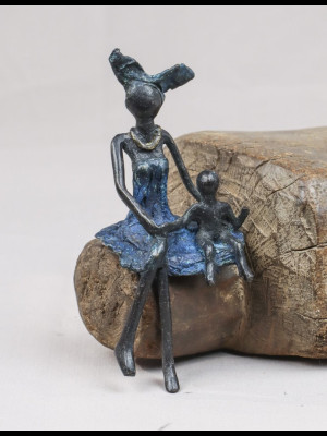 Seated woman with a child (bronze)