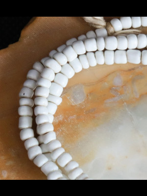 Strand of small vintage porcelain trade beads