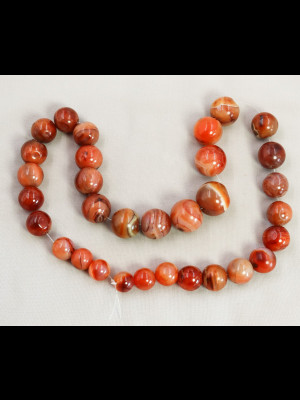 32 round carnelian beads