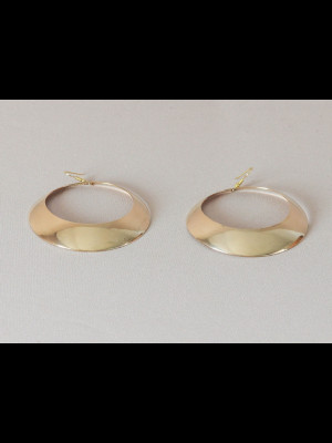 Large earrings in brass