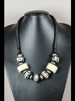 Necklace with bakelite heishi disk and bone beads