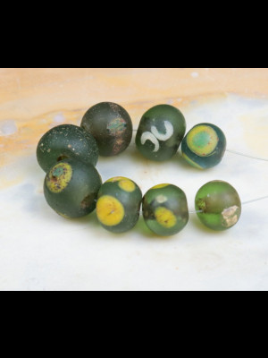 Set of 8 ancient islamic glass beads