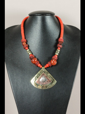   Necklace with carnelian, glass, brass, koffi beads and a brass medallion