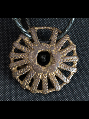 Pendant in bronze "Dogon sun"