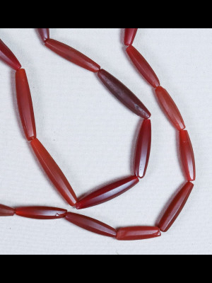 Mock carnelian faceted glass trade beads