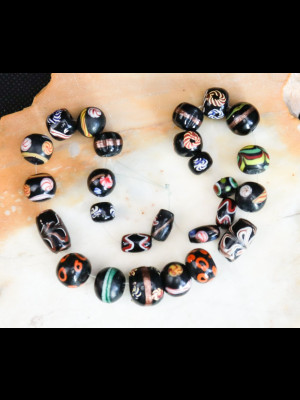 Strand of 26 glass beads