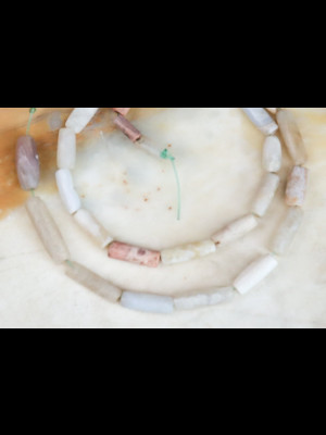 Strand of 28 old agate beads