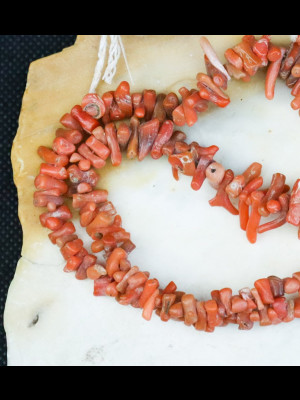 Strand of coral beads.