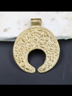 Pendant in brass