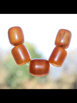 5 African amber beads (phenolic resin)