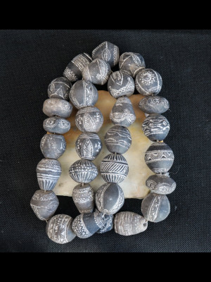 30 old terracotta spindle whorls