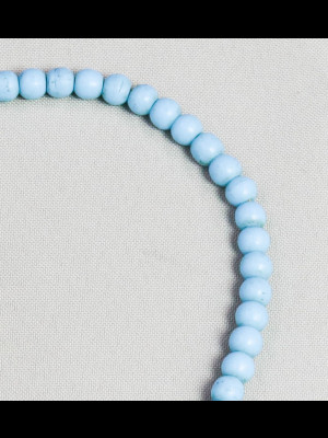 83 "Padre beads"