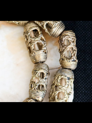 Strand of 19 brass beads