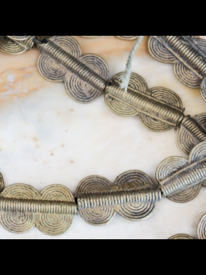 Strand of 22 brass beads