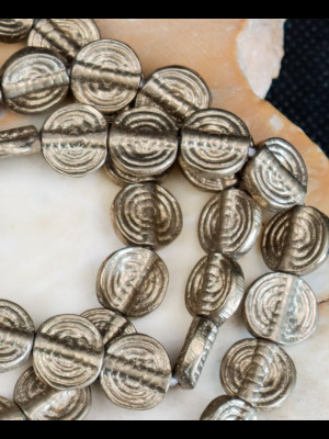 Strand of 57 brass beads