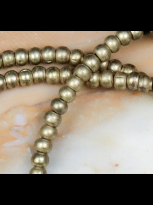 Strand of 214 small brass beads