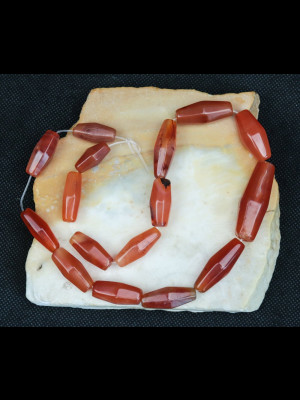 16 faceted carnelian beads
